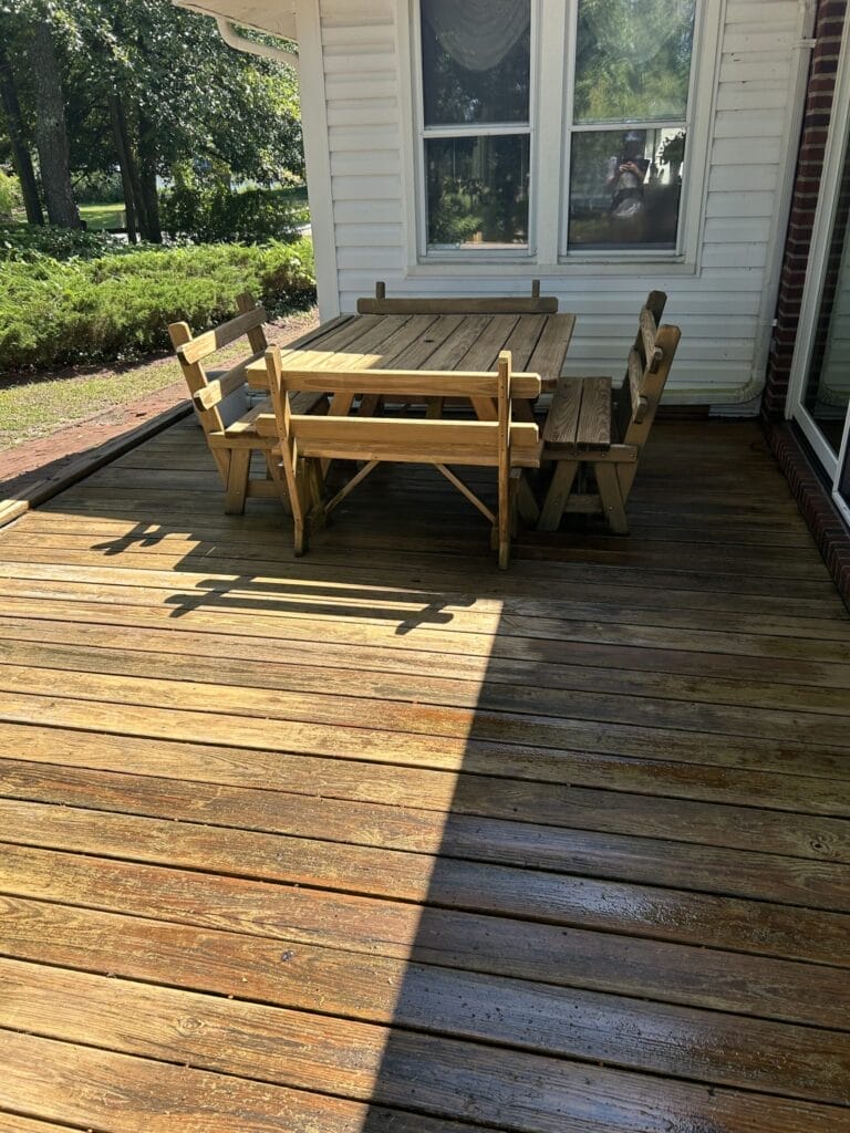 Keenwick cleaning outdoor garden furniture during residential power restoration