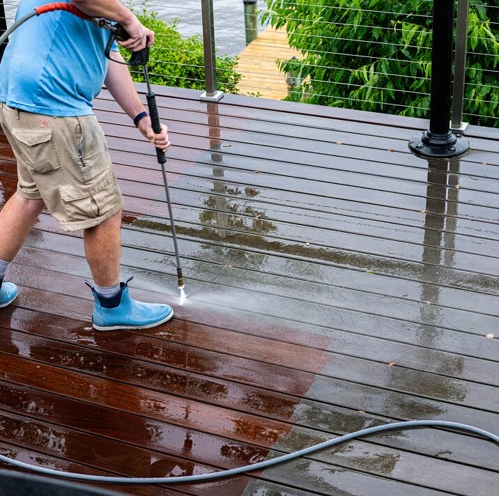 Exterior floor cleaning service removing dirt and grime
